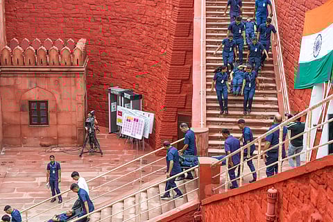 Security personnel conduct a mock drill during full dress rehearsal for the 78th Independence Day celebrations at Red Fort, in New Delhi, Tuesday, Aug. 13, 2024